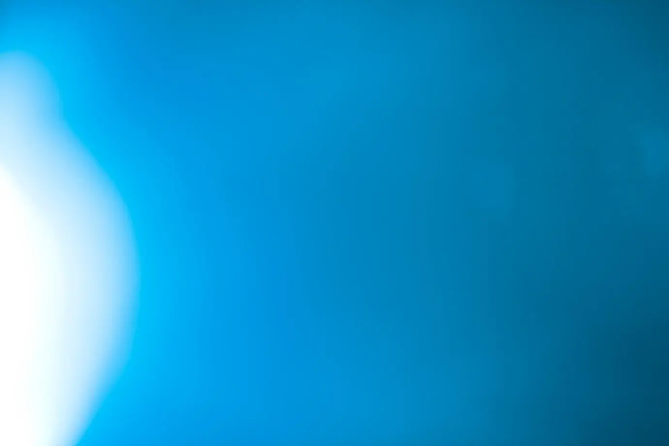 A bright light against a black background