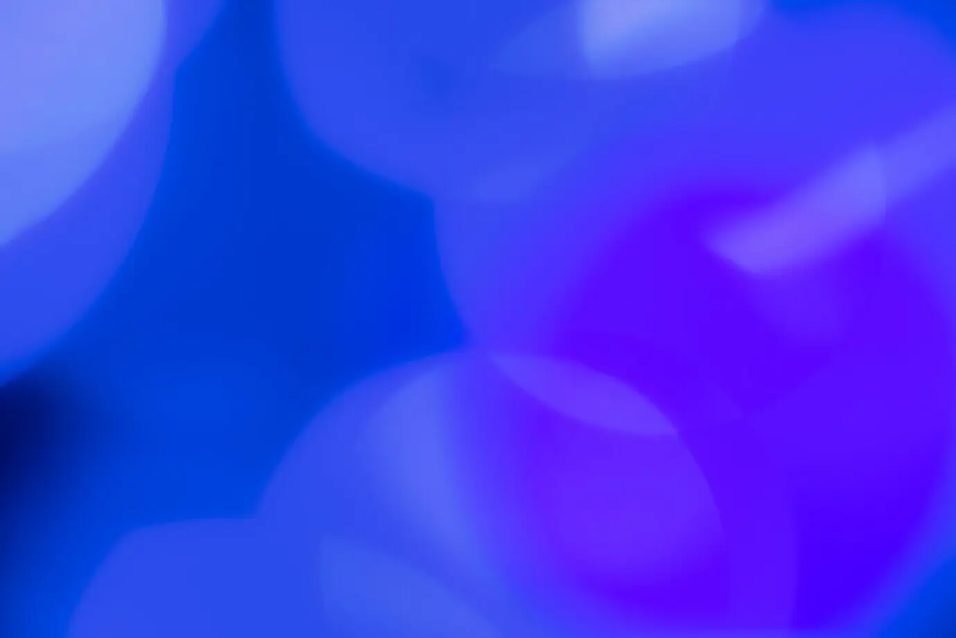 A blurred abstract background with blue lights