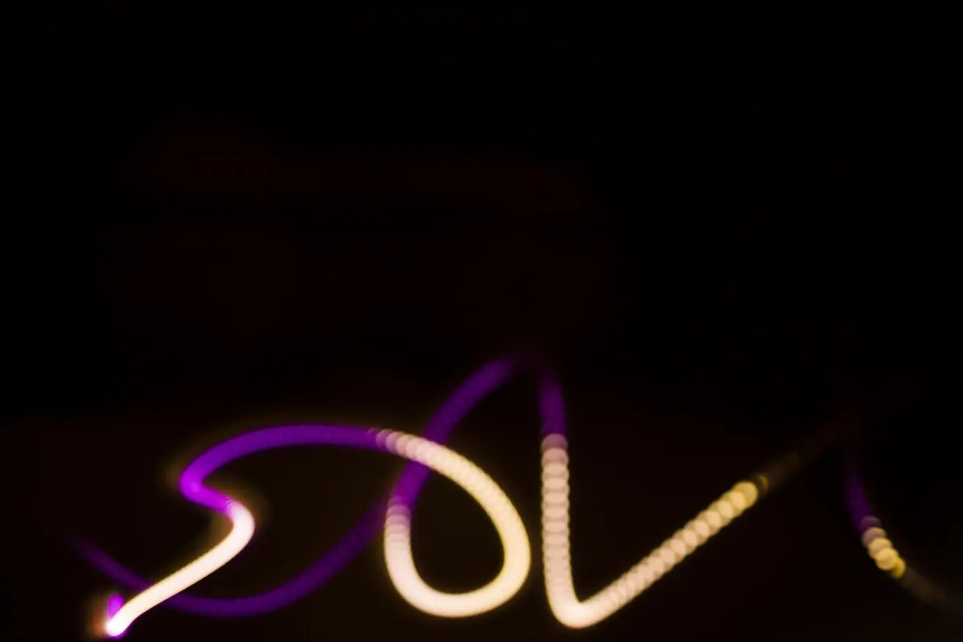 Background featuring lines of light streaks.